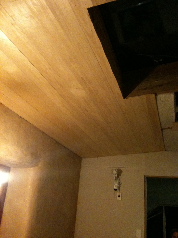 Wooden ceiling in bedroom