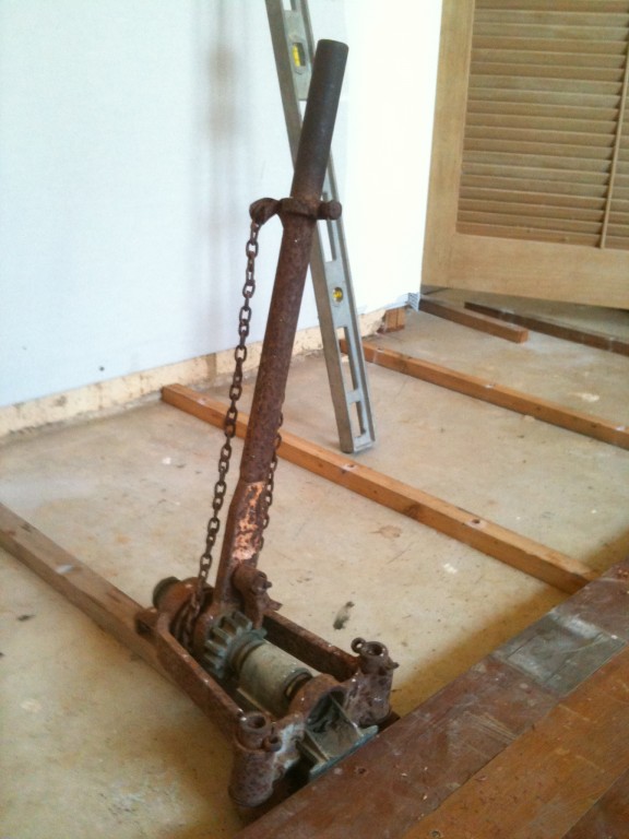 Corroded old floor board tensioner